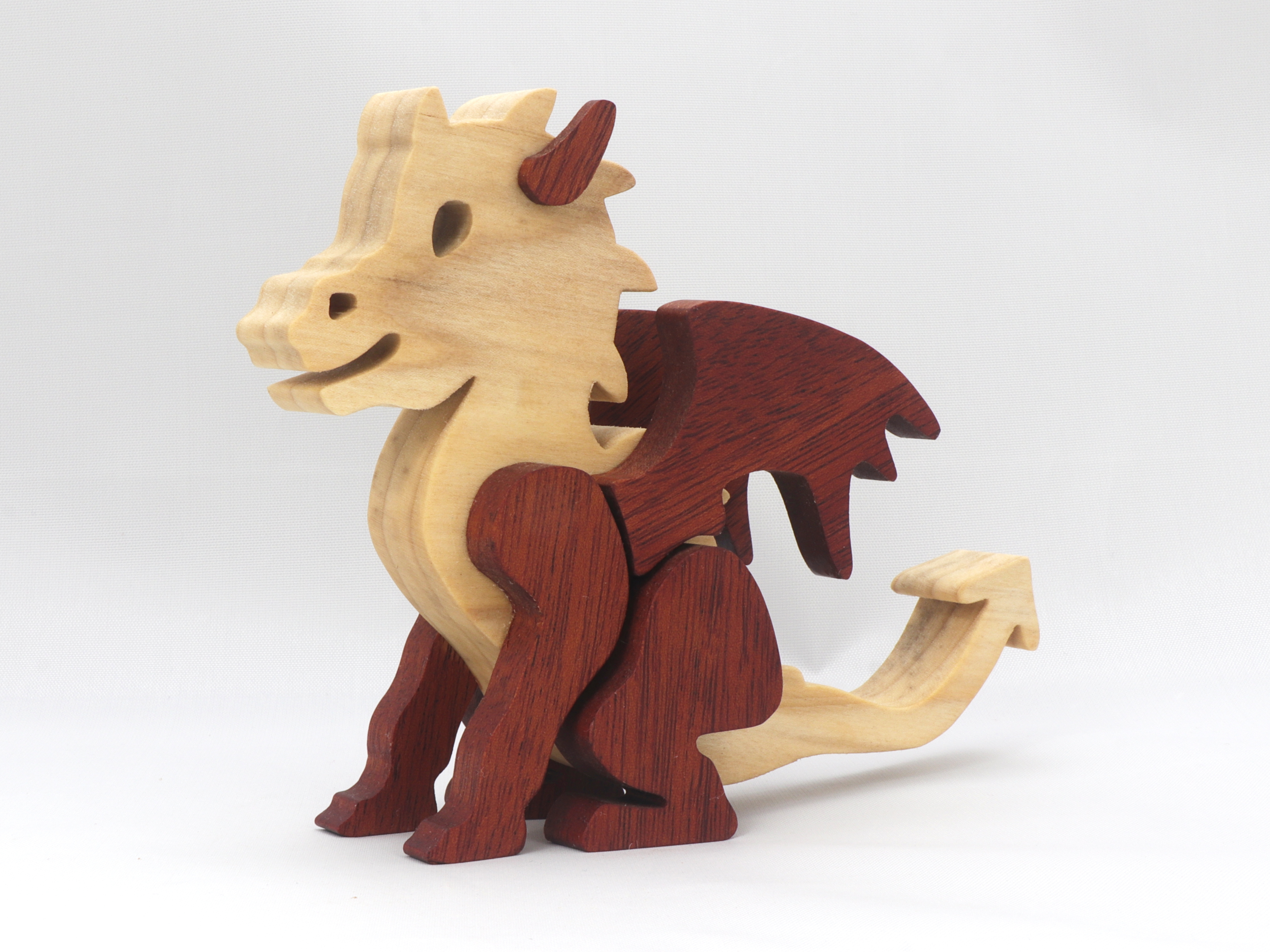 Baby wooden toy dragon.