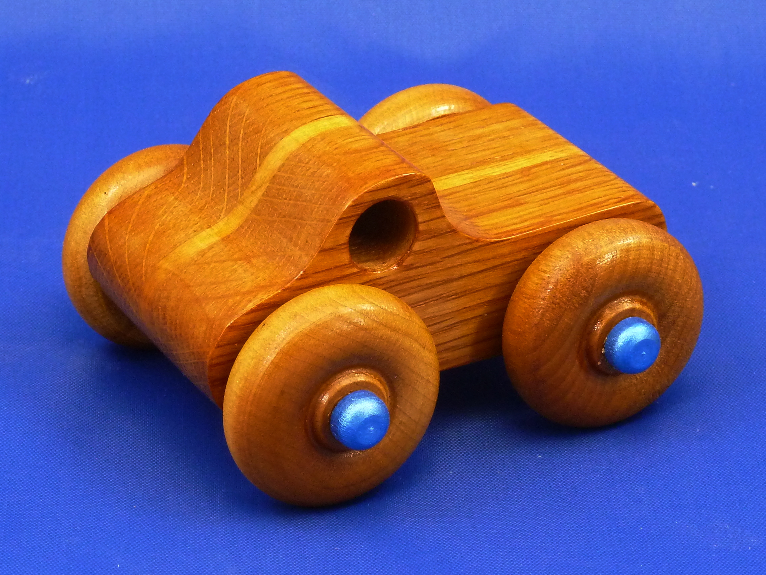 Handmade Wooden Toy Monster Pickup Truck Finished With Amber Shellac and Metallic Saphire Blue Paint From My Play Pal Collection.
