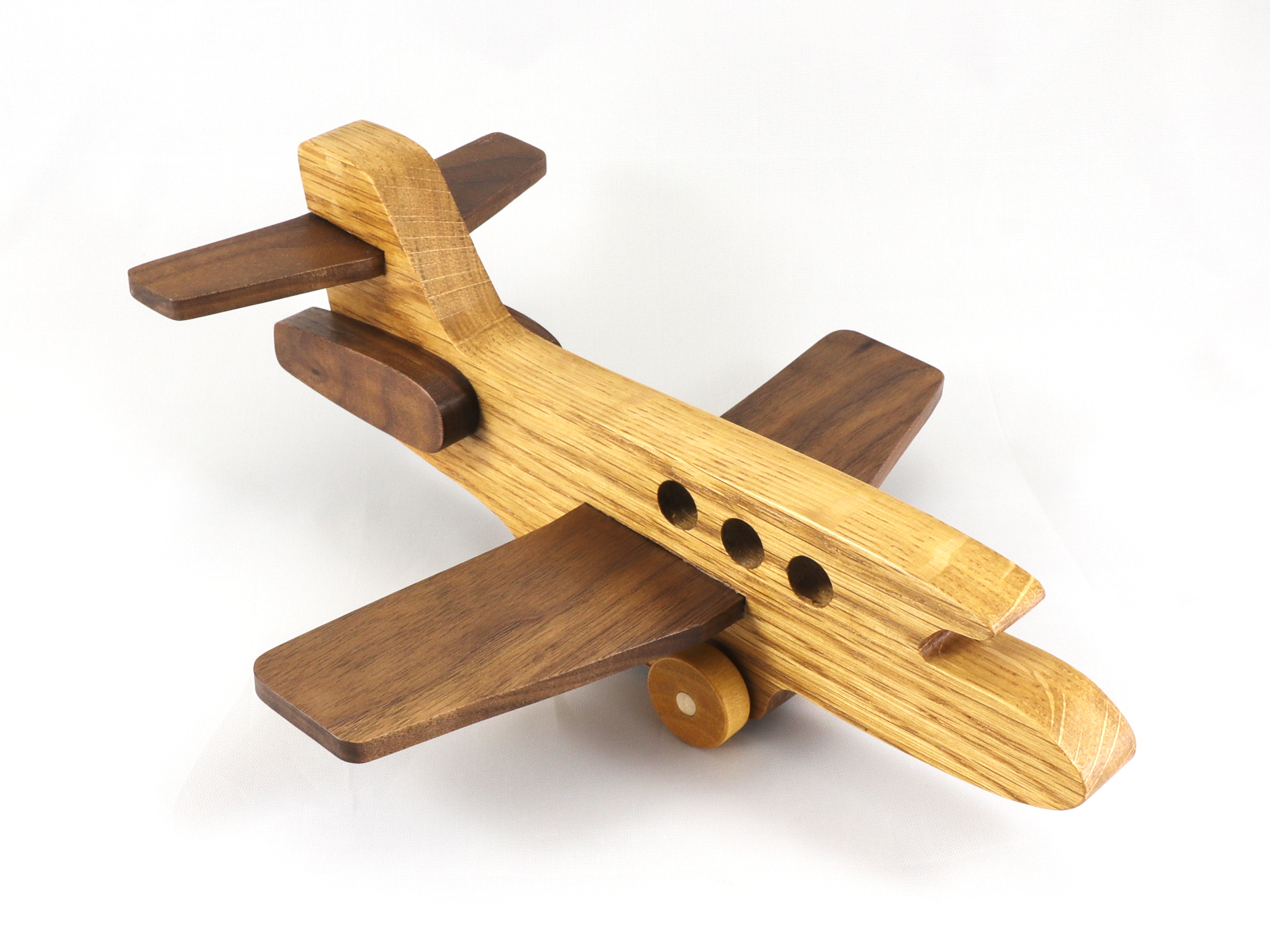 Handmade wooden toy airplane/airliner made from select-grade hardwoods such as oak, walnut, and birch. It is sized for use with the toy vehicles in my Play Pal Collection.