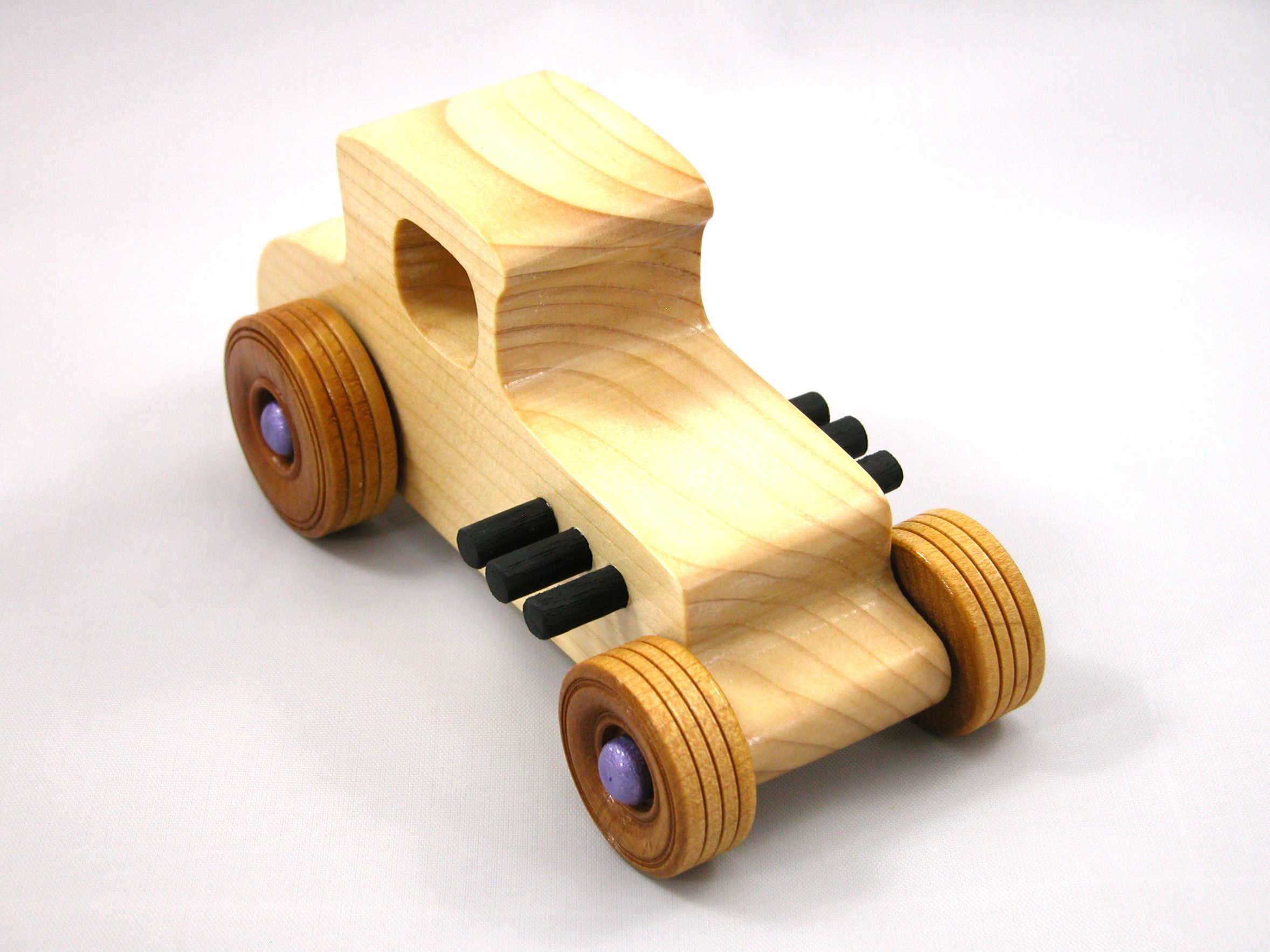 Handmade wooden toy car Hot Rod '27 T-Coupe handmade and finished with nontoxic amber shellac with metallic purple and black trim. From my Hot Rod Collection.