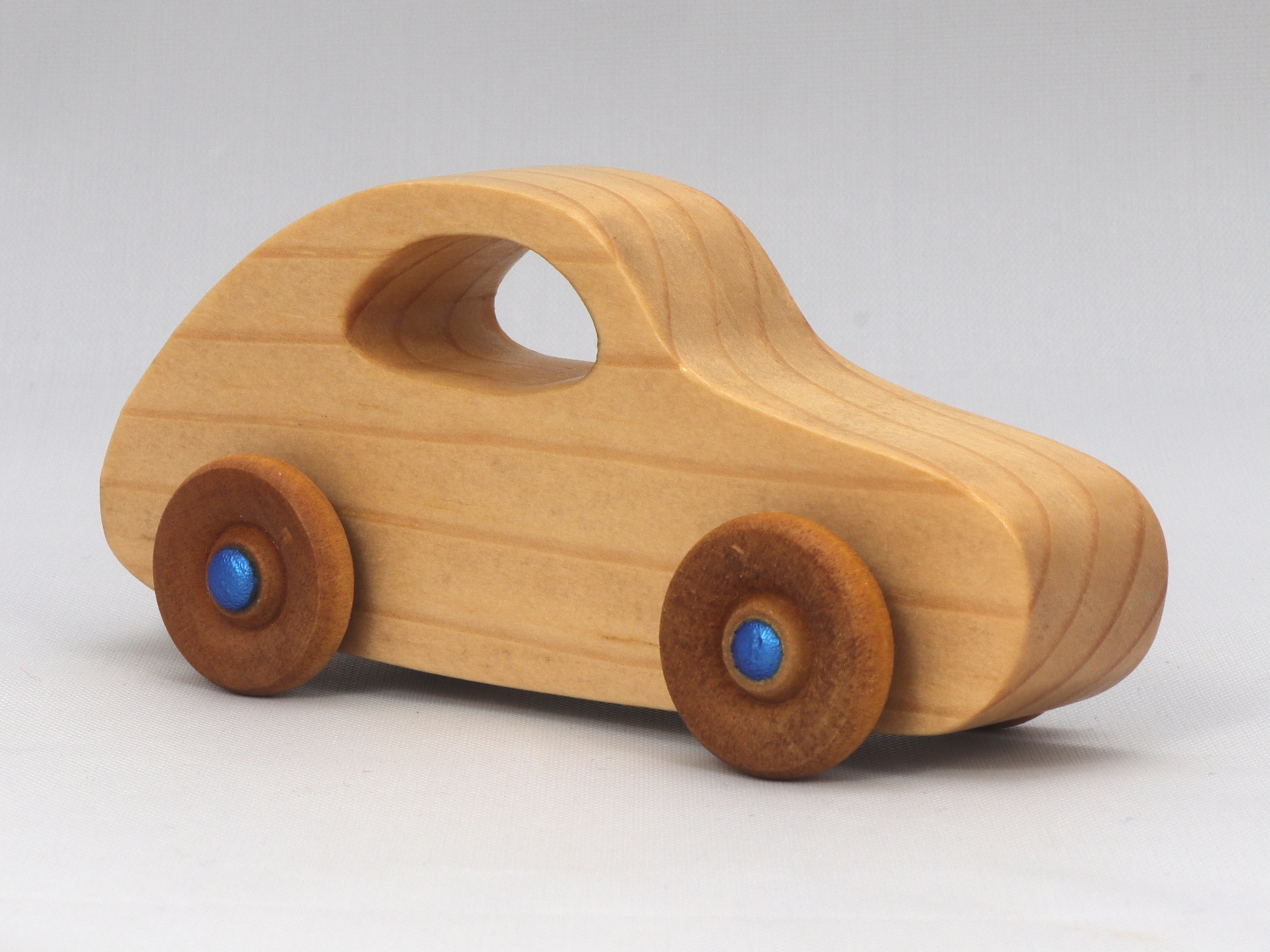 Handmade Wood Toy Car Hand Finished With Clear And Amber Shellac And Trimmed With Metallic Saphire Blue Acrylic Paint