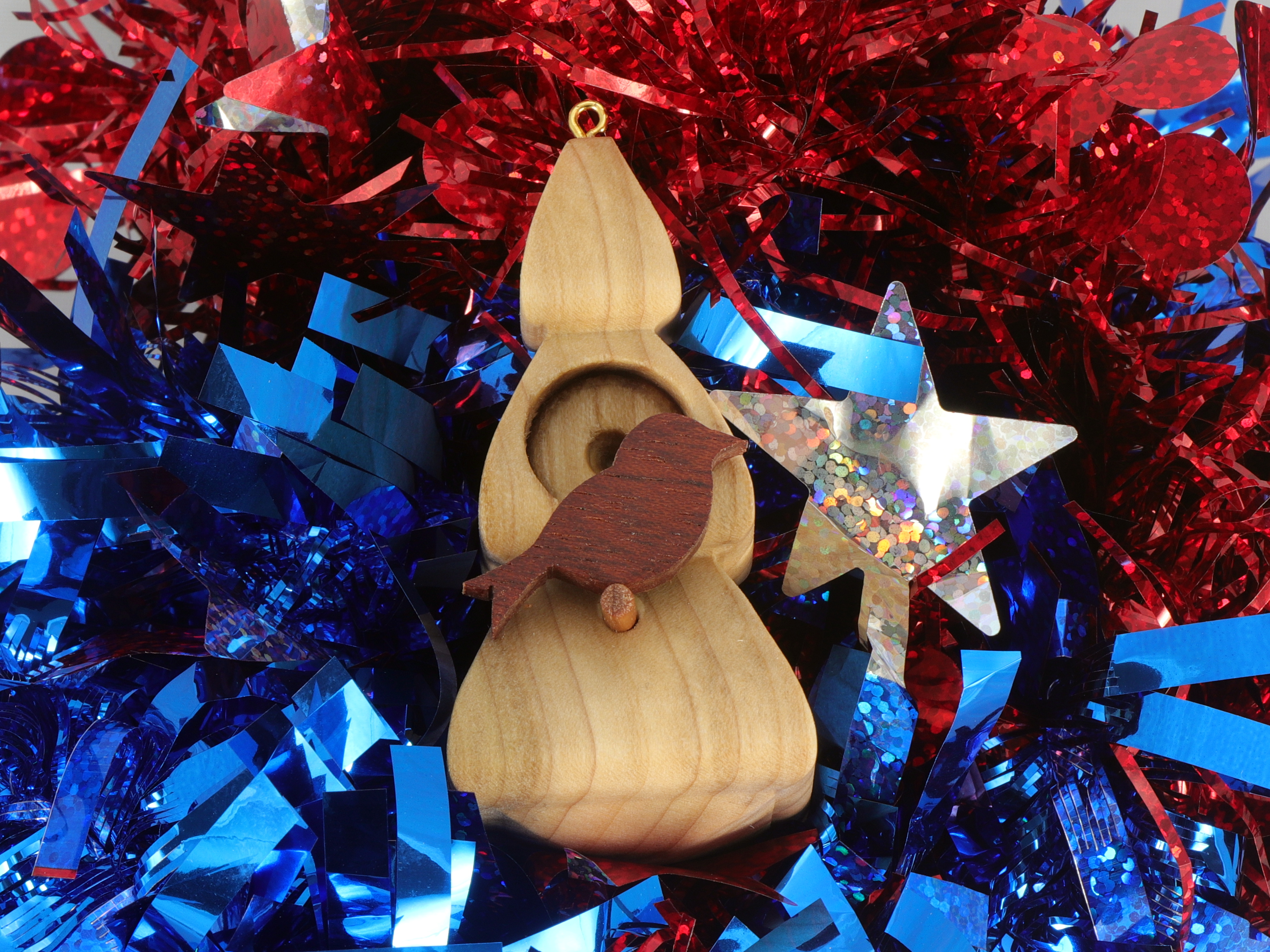 Handmade Wood Birdhouse Ornament Collectable Christmas Tree Ornament shapeed like a Christmas tree. Made from select-grade hardwoods, hand-sanded, and finished with a custom blend of oils and waxes using traditional woodworking tools.