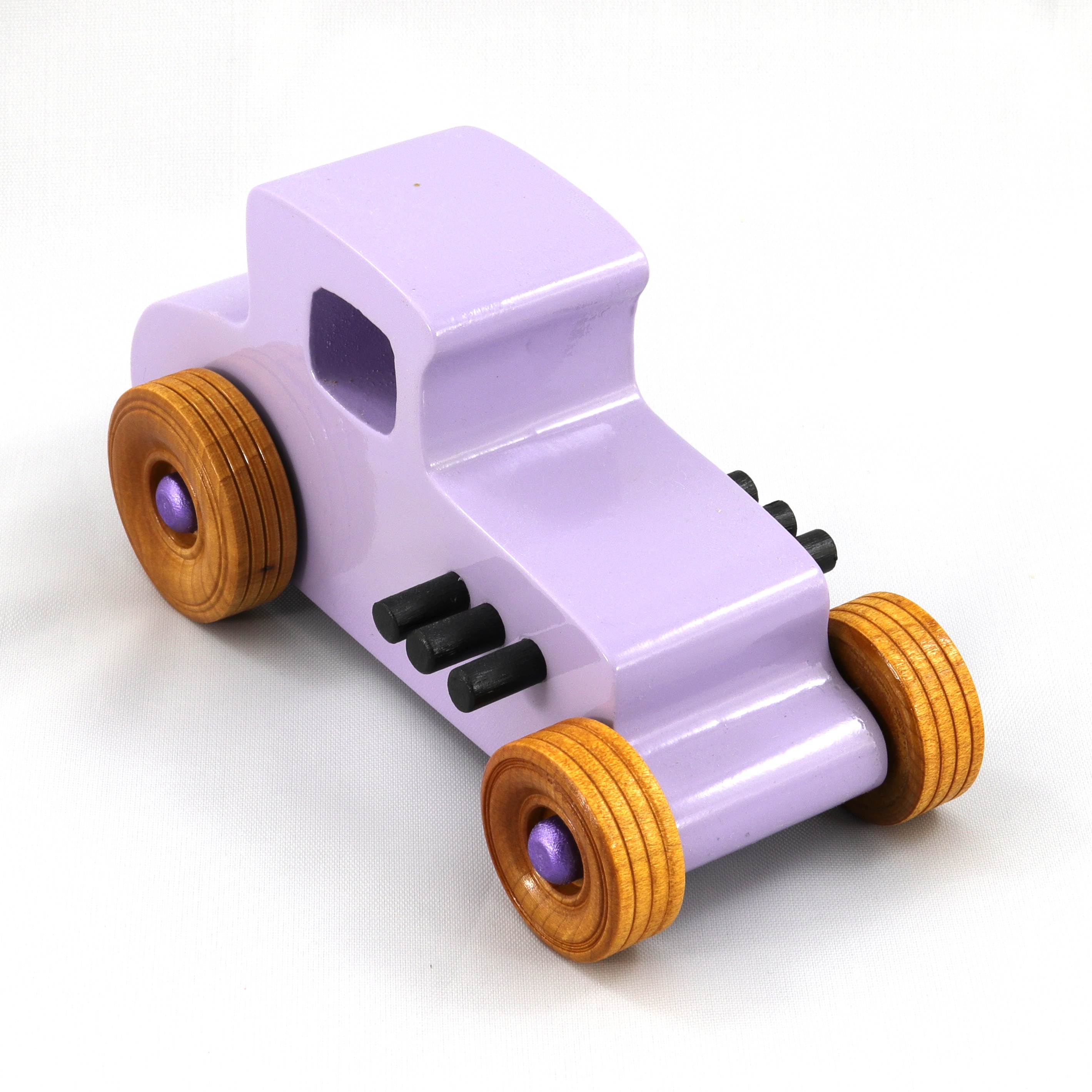 Handmade Wooden Toy Car Hot Rod '27 T-Coupe Finished with nontoxic Lavender, metallic purple, and Black Acrylic Paint with nonmarring Amber Shellac wheels.