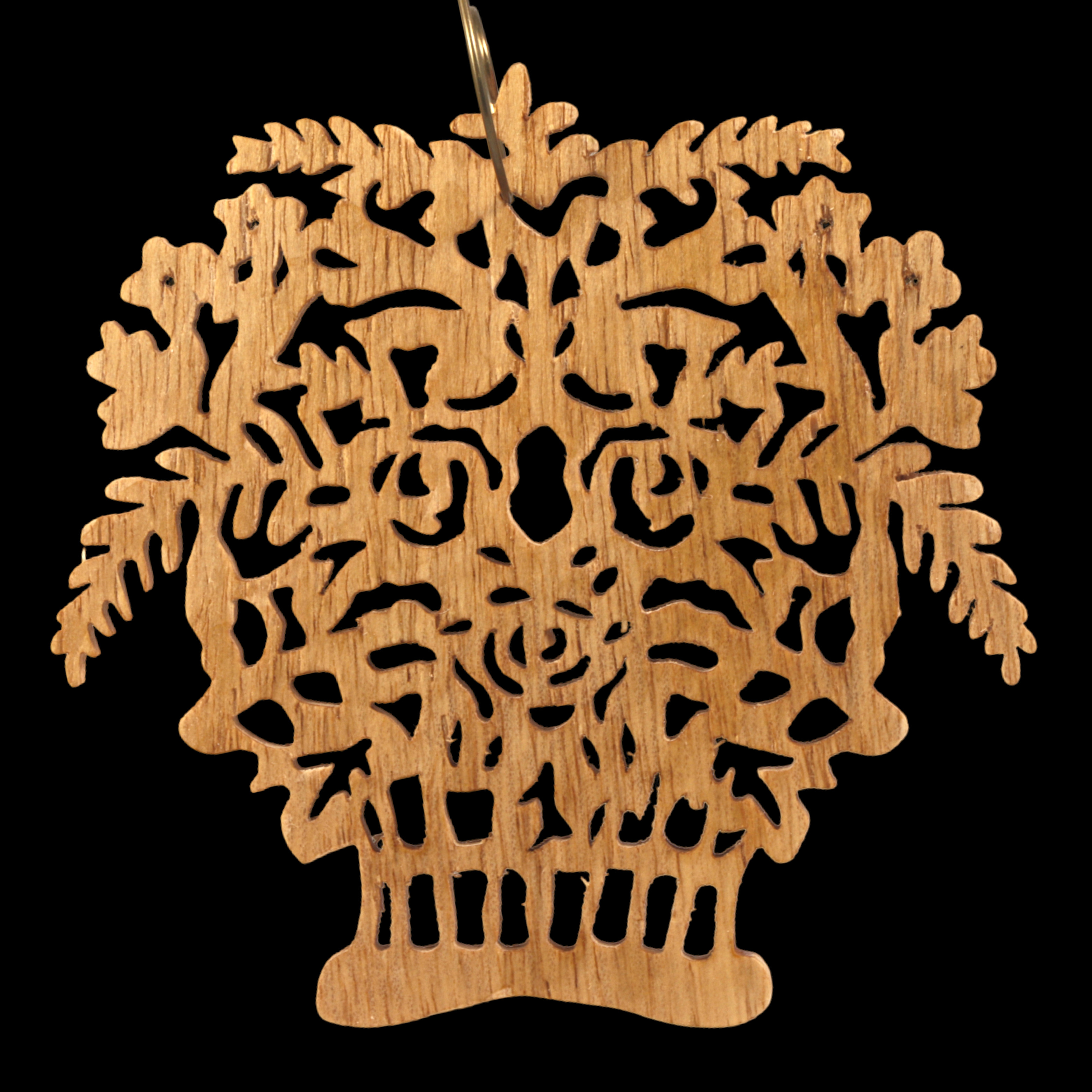 A handcrafted Victorian-style wooden Christmas tree ornament shaped like a basket filled with intricate floral designs, featuring detailed leaves and blossoms, with a small hook at the top for hanging.